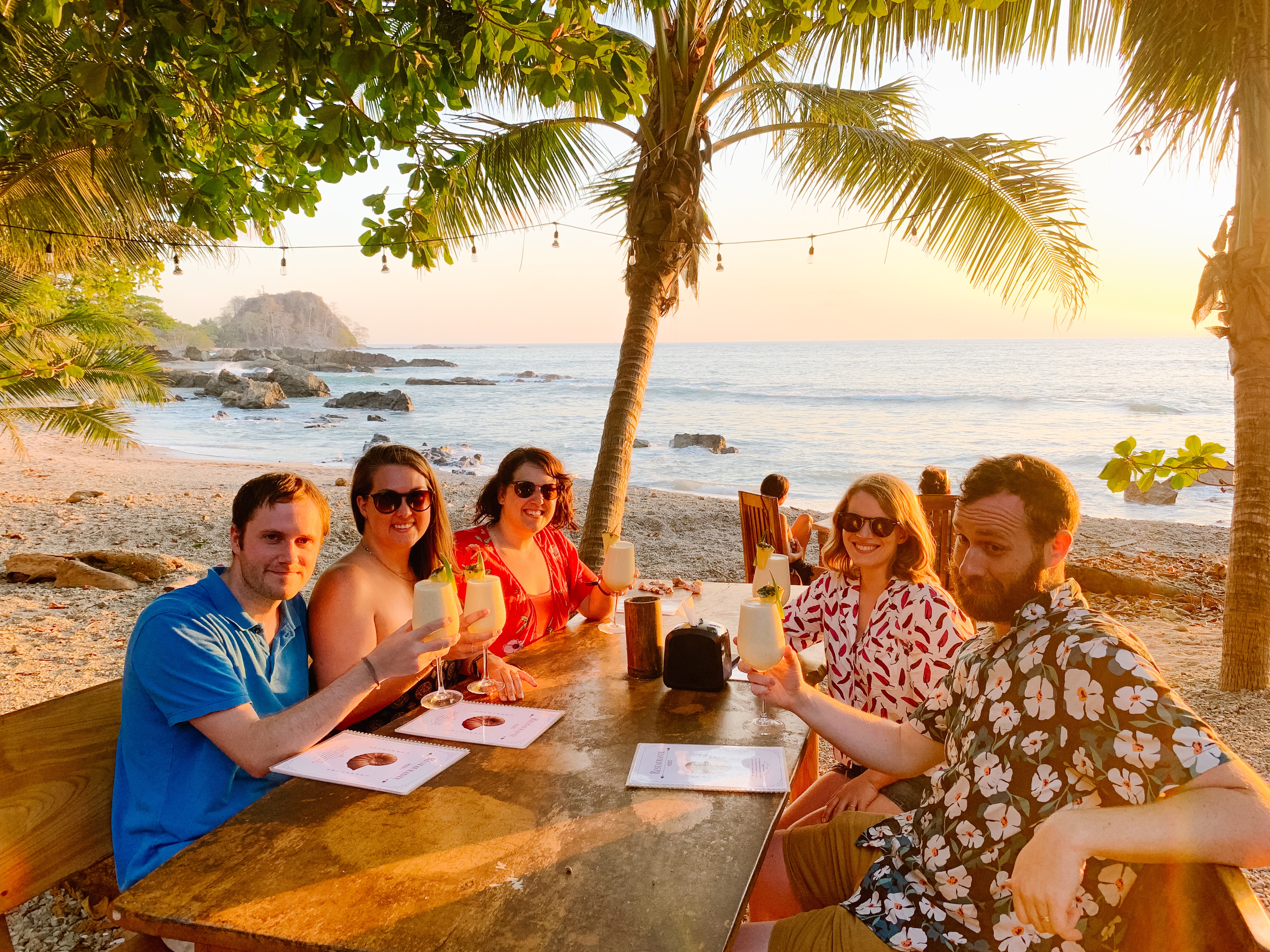 friends on the beach at sunset